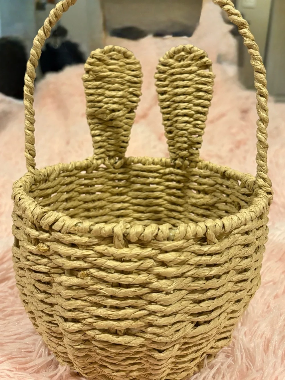 Homemade woven wicker and rattan bunny ear baskets.